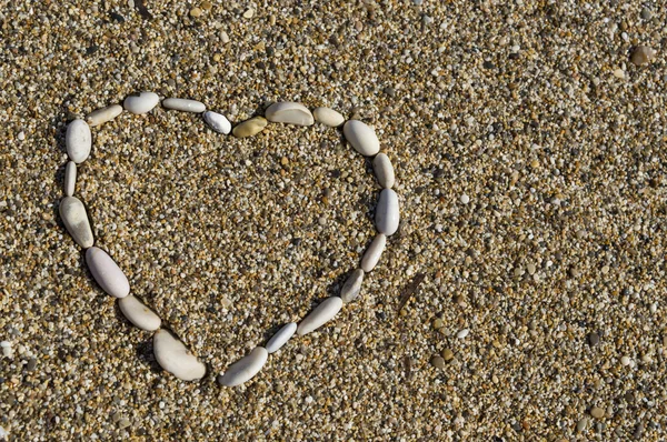 Heath shape of beach rocks — Stock Photo, Image