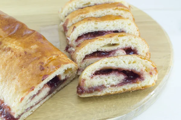 Homemade strudel with strawberry jam — Stock Photo, Image