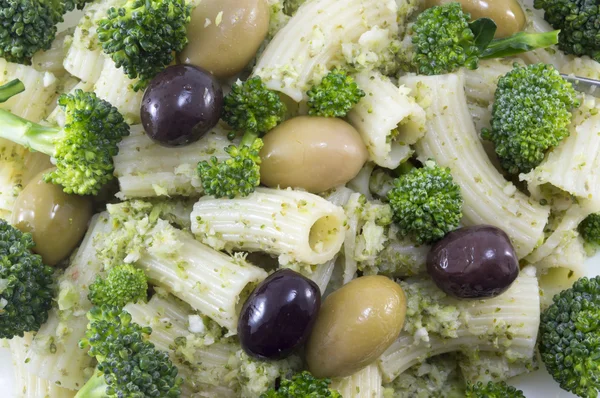 Pasta with broccoli and olives close up — Stock Photo, Image