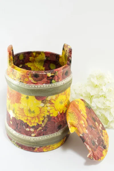 Decoupage decorated flower pattern jar on white background — Stock Photo, Image