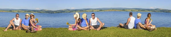 Happy friends on a picnic — Stock Photo, Image