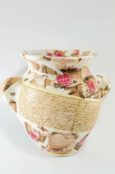 Decoupage decorated flower pattern jar on white background — Stock Photo, Image