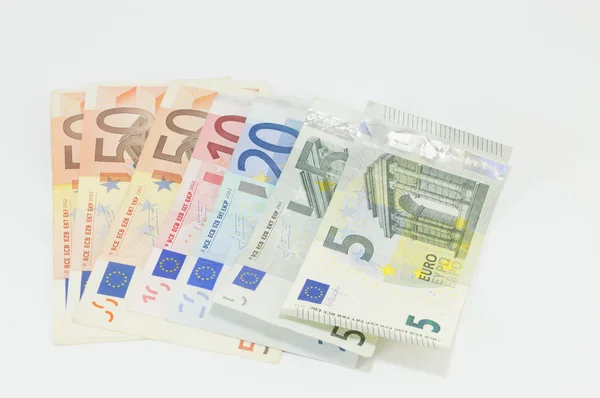 Euro bills placed on white background — 图库照片