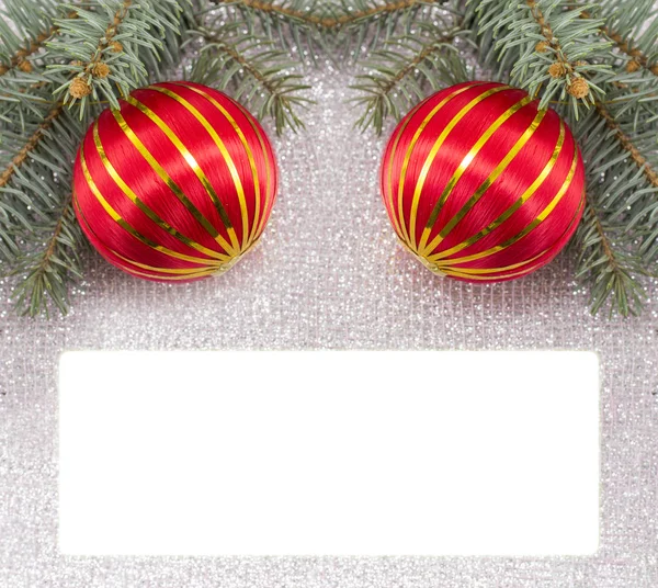 Merry Christmas card decorated with Christmas ornaments and fir — Stock Photo, Image