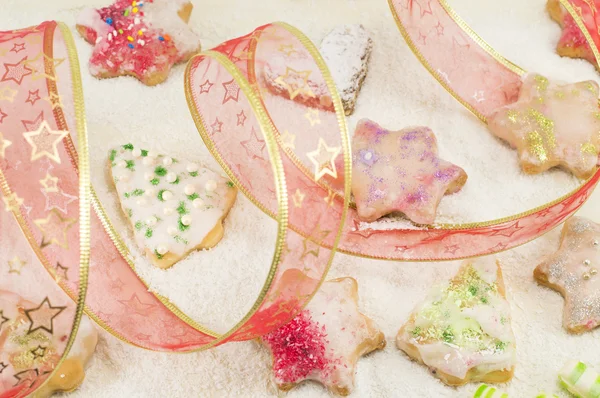 Star shaped Christmas cookies and decorative tape — Stock Photo, Image