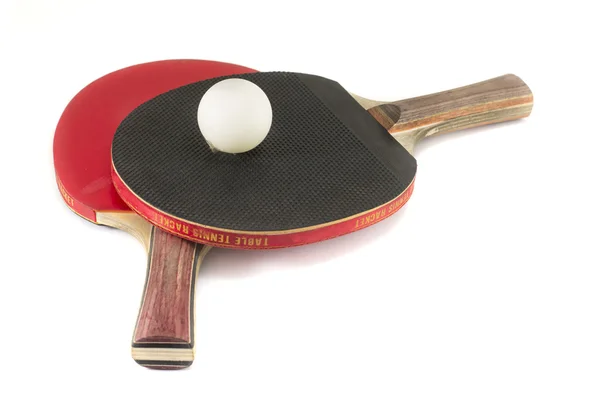 Two table tennis rackets and a ball isolated — Stock Photo, Image