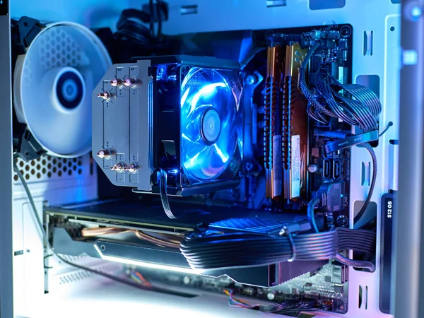 Gaming computer with RGB LED light. Components of the computer. PC case with backlight