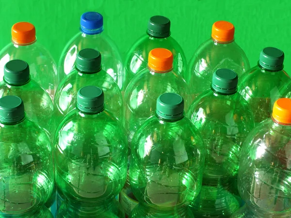 A lot of plastic bottles with coloured shutter — Stock Photo, Image