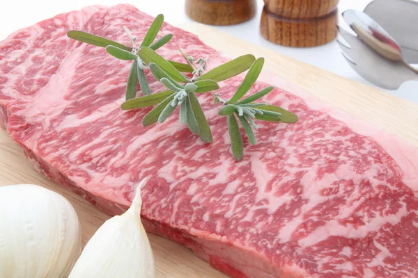 Beef steak with garlic — Stock Photo, Image