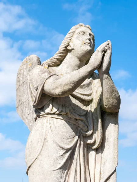 Statue of a prayer angel Stock Image