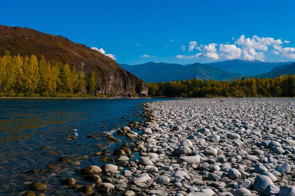 View of the parched bed of mountain river covered with stones — Stock Photo, Image