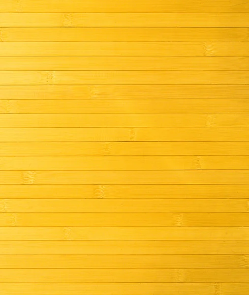 水平方向に整理される黄色の木製のスラットの表面 (壁) の断片 — ストック写真
