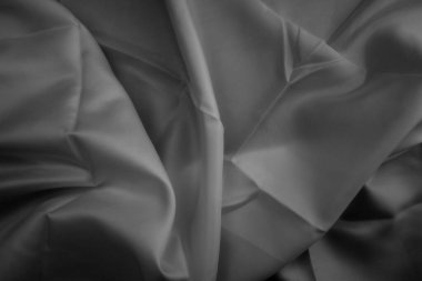 Gri kumaş dokusu arkaplanı, soyut, kumaşın yakın dokusu