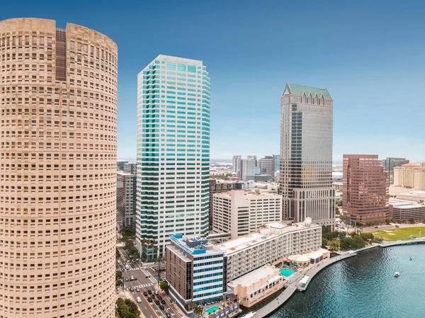 American City Downtown. Hillsborough river. Beautiful day cityscape. Glass and reinforced concrete Residential and commercial skyline buildings. Aerial photography - Tampa, Florida USA. 4 July 2021