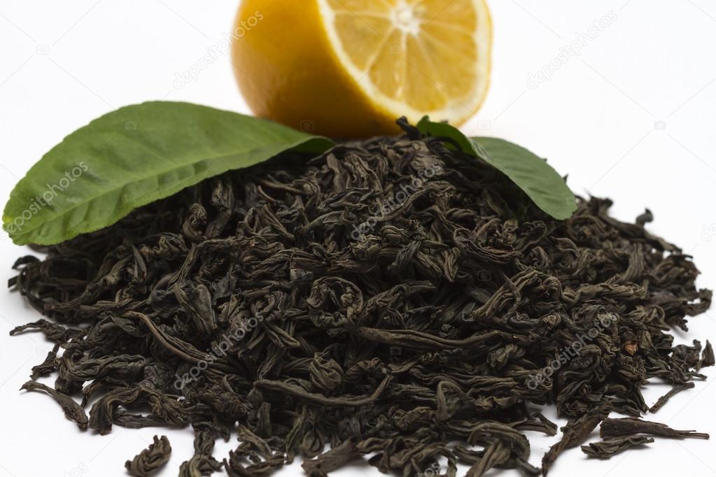 The leaves are dried and twisted black Ceylon tea closeup.
