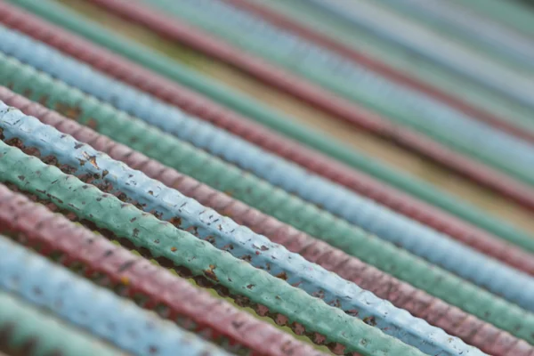 Background of colored rods fittings. — Stock Photo, Image