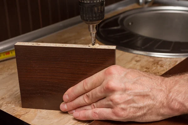 Drilling chipboard. — Stockfoto