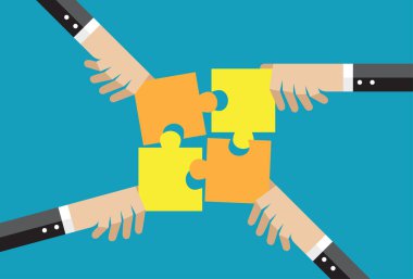 İş adamlarının elleri yapbozu bir arada tutuyor.