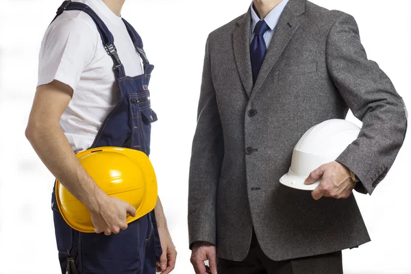 Businessman with helmet and worker with helmet — Stock Photo, Image