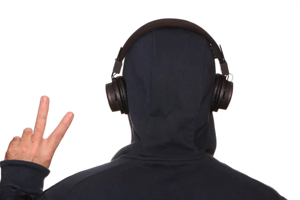 Man Sports Jacket Hood His Head Listens Music Headphones His — Stock Photo, Image