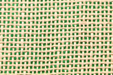 Farklı renk bazlı lifli bir kumaşın soyut arkaplanı. Çuval bezi arka planı.