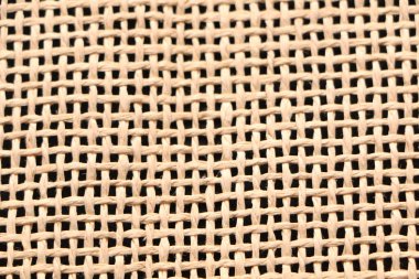 Farklı renk bazlı lifli bir kumaşın soyut arkaplanı. Çuval bezi arka planı.