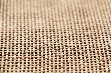 Farklı renk bazlı lifli bir kumaşın soyut arkaplanı. Çuval bezi arka planı.