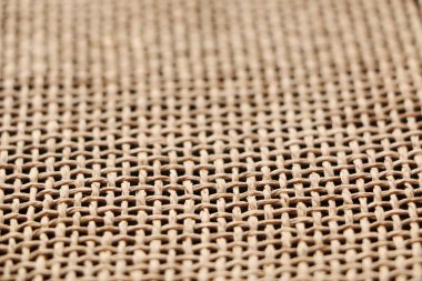 Farklı renk bazlı lifli bir kumaşın soyut arkaplanı. Çuval bezi arka planı.