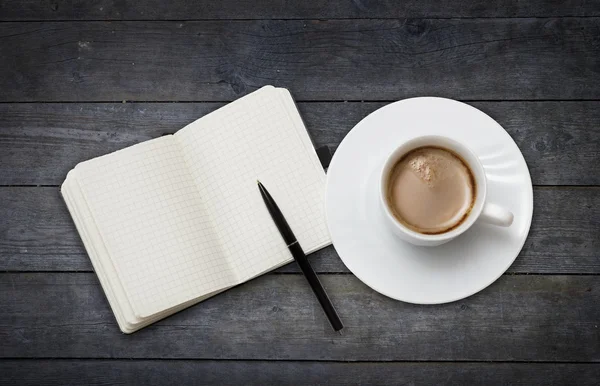 Coffee cup and note book — Stock Photo, Image