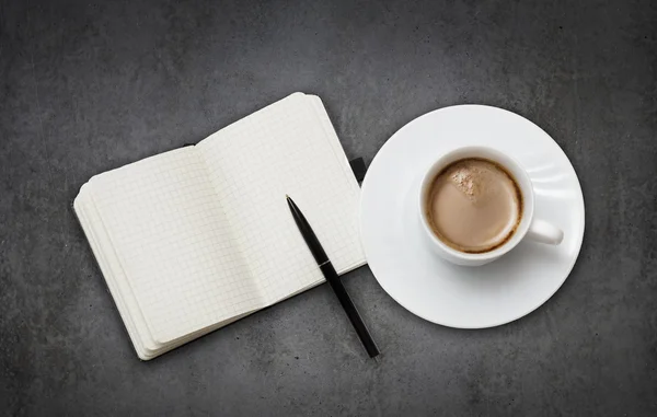 Coffee cup and note book — Stock Photo, Image