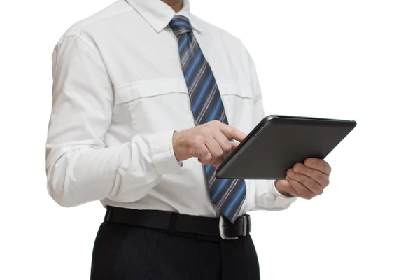 Homme d'affaires en chemise blanche avec une tablette — Photo