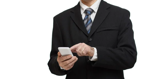 Businessman in a suit with smartphone — Stock Photo, Image