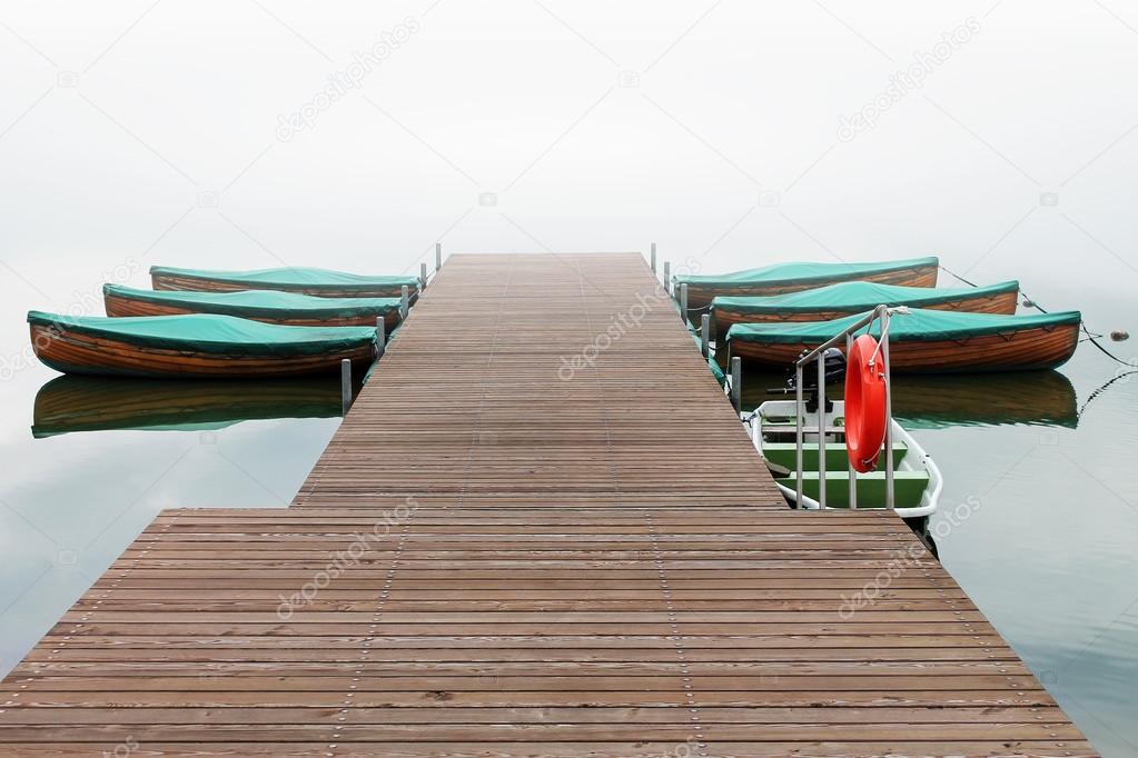 Wooden pier and  boats