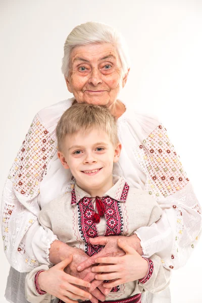 Grandmother with grandson. Grandmother hugging her grandson. — Stock Photo, Image