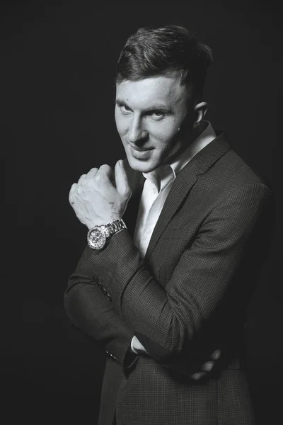 black and white photography. Model. A guy in a business suit.