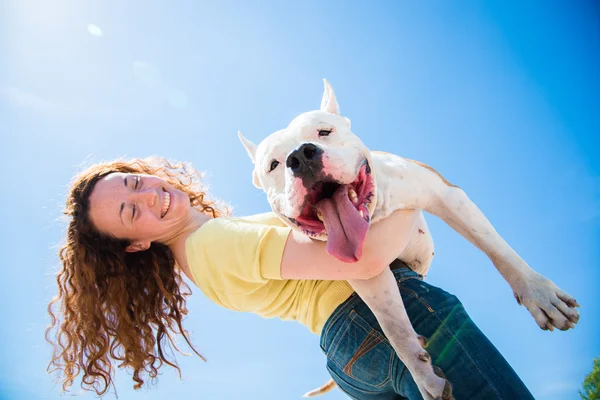 Girl with a dog on the nature — Stock Photo, Image