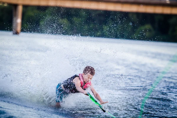 A child riding in the Wakeboarding — Stock Photo, Image