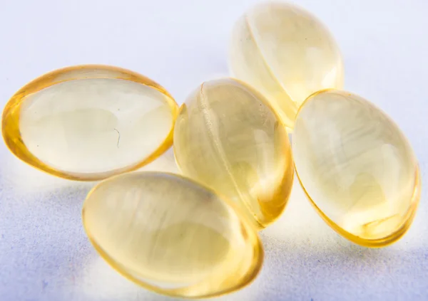 Fish oil tablets. macro — Stock Photo, Image