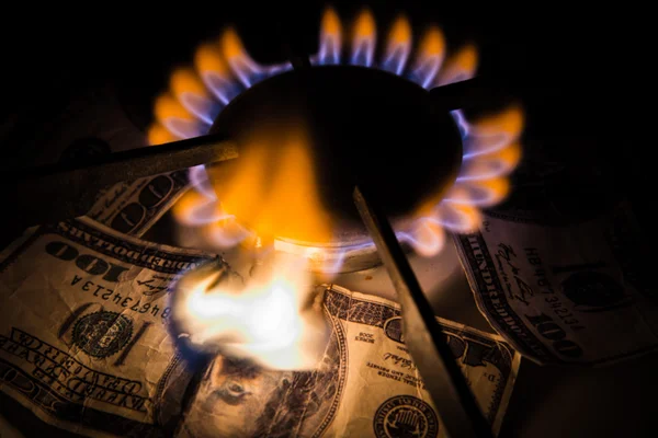 Gas stove. Dollars on a gas cooker — Stock Photo, Image