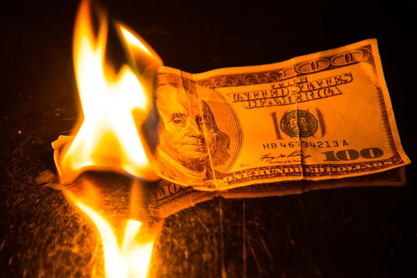 One hundred dollar bill on fire — Stock Photo, Image