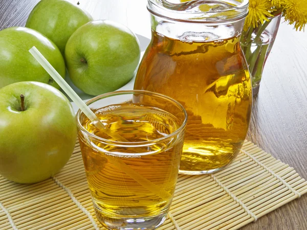 Apple juice in a bottle — Stock Photo, Image