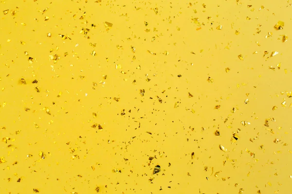 Confete Dourado Sobre Fundo Papel Amarelo Fundo Festivo Férias Congratulações — Fotografia de Stock