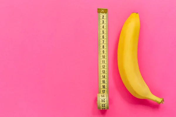 Yellow Banana Measurement Tape Pink Background Men Penis Size Concept — Foto de Stock