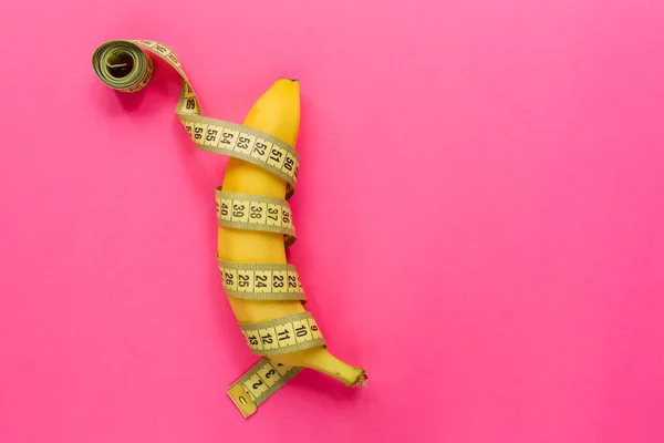 Yellow Banana Measurement Tape Pink Background Men Penis Size Concept — Stok fotoğraf