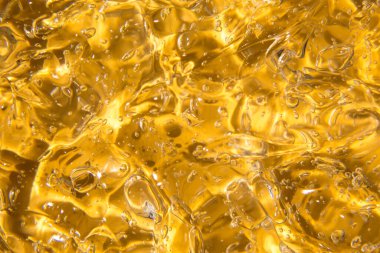 Şeffaf sıvı jel serumu dokusu. Makyaj ve kozmetik dokusu arka plan, cilt ürünü ve güzellik kremi