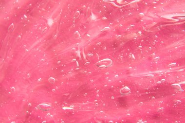 Şeffaf sıvı jel serumu dokusu. Makyaj ve kozmetik dokusu arka plan, cilt ürünü ve güzellik kremi