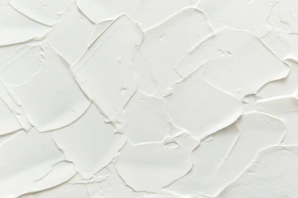 Fehér kozmetikai krém textúra. Testápoló, hidratáló, bőrápoló, kozmetikai termék háttér. Stock Kép