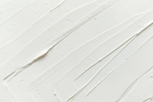 Textura de creme cosmético branco. Loção, hidratante, cuidados com a pele, fundo do produto de beleza. Fotografia De Stock