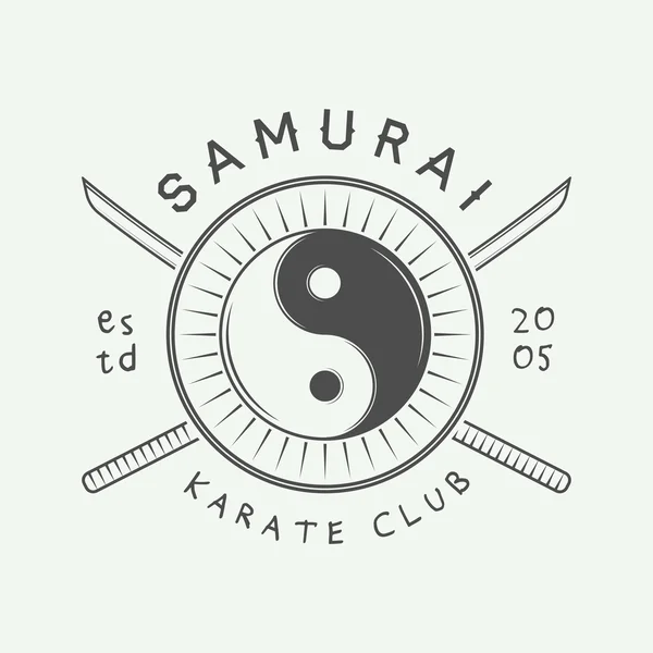 Vintage karate or martial arts logo Stock Vector