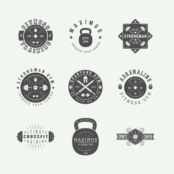 Set of gym logos, labels and slogans in vintage style. — Stock Vector